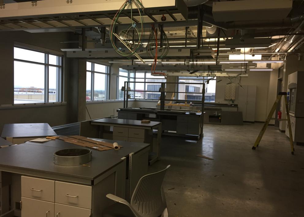 The Allgeier Lab during construction - workbenches and chairs.