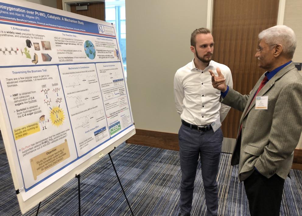 Kyle Stephens (left) presenting his poster to Dr. Raghunath Chaudhari (right) during the CEBC Industry Advisory Board meeting.