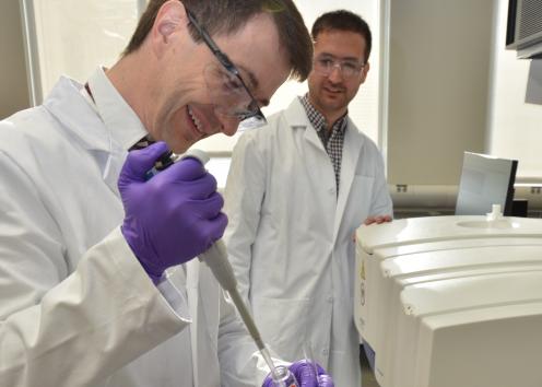 Dr. Alan Allgeier (left) and Phd student Simon Velasquez (right) doing experiments in the lab.
