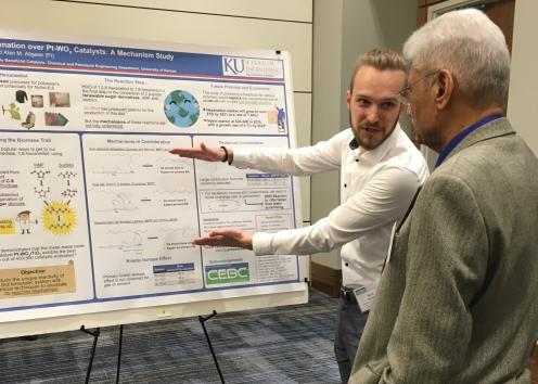 Kyle Stephens (left) explaining his research to Dr. Raghunath Chaudhari (right) during the CEBC Industry Advisory Board meeting.