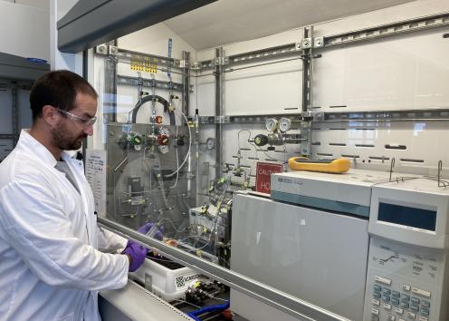PhD student Simon Velasquez running experiments in the lab.
